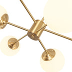 Modern Buchholtz 90cm opal glass bubble Sputnik chandelier with multiple spherical glass shades and sleek metal accents.