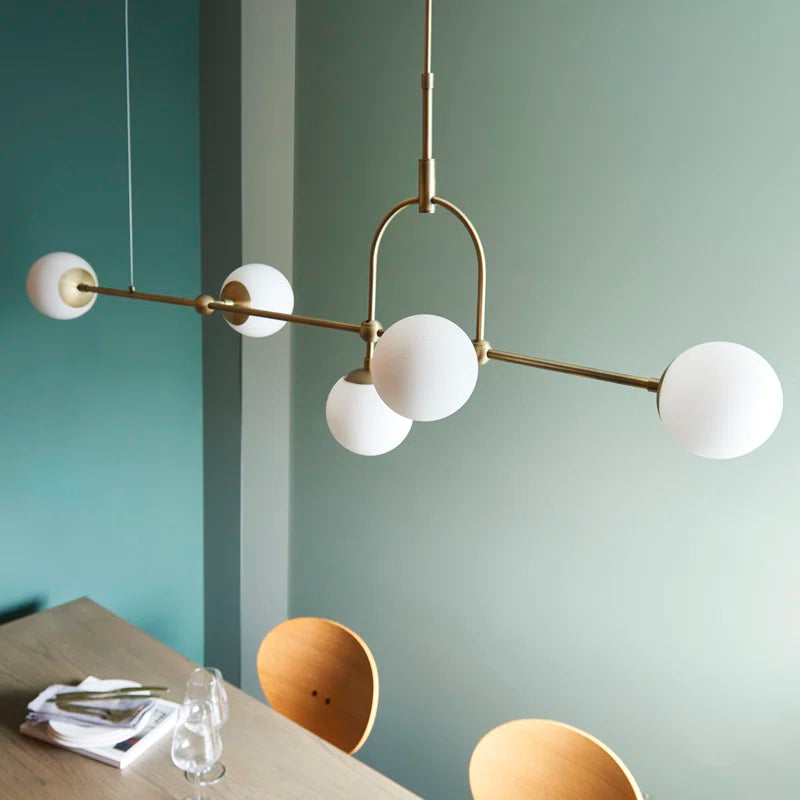 Cadel Impressive 5-light antique brass linear chandelier with modern design and elegant metal frame, hanging from ceiling.