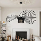 Light black Carlose 1 statement pendant light by TheChandelierCo with artistic ribbed design and decorative frame.