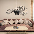 Light black Carlose 1 pendant light by TheChandelierCo featuring an artistic ribbed design and decorative frame for modern decor.