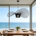 Light black Carlose 1 pendant light by TheChandelierCo featuring an artistic ribbed design and decorative frame.