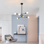 Modern Cobina 6-light Sputnik chandelier by TheChandelierCo with a sleek metal finish and six exposed bulbs in a starburst design.