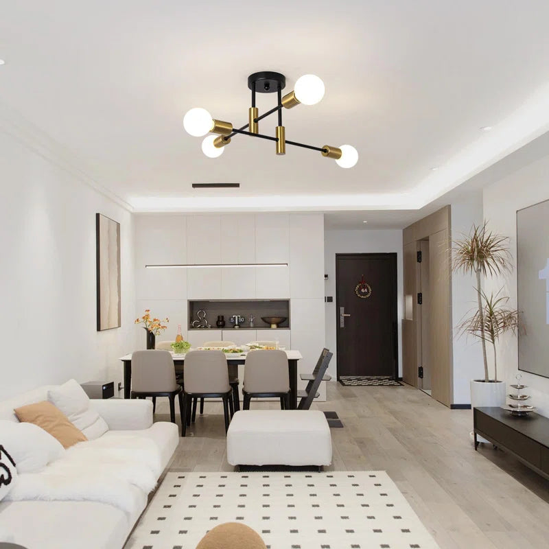 Coblitz 4 Light Sputnik chandelier by TheChandelierCo featuring a modern starburst design with four exposed bulbs and metal arms.