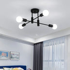 Coblitz 4 Light Sputnik chandelier by TheChandelierCo featuring a modern metallic design with four adjustable light fixtures.
