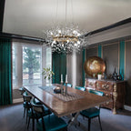 Light geometric starburst sunburst pendant from Dandelion 12 collection by TheChandelierCo, showcasing intricate design details.