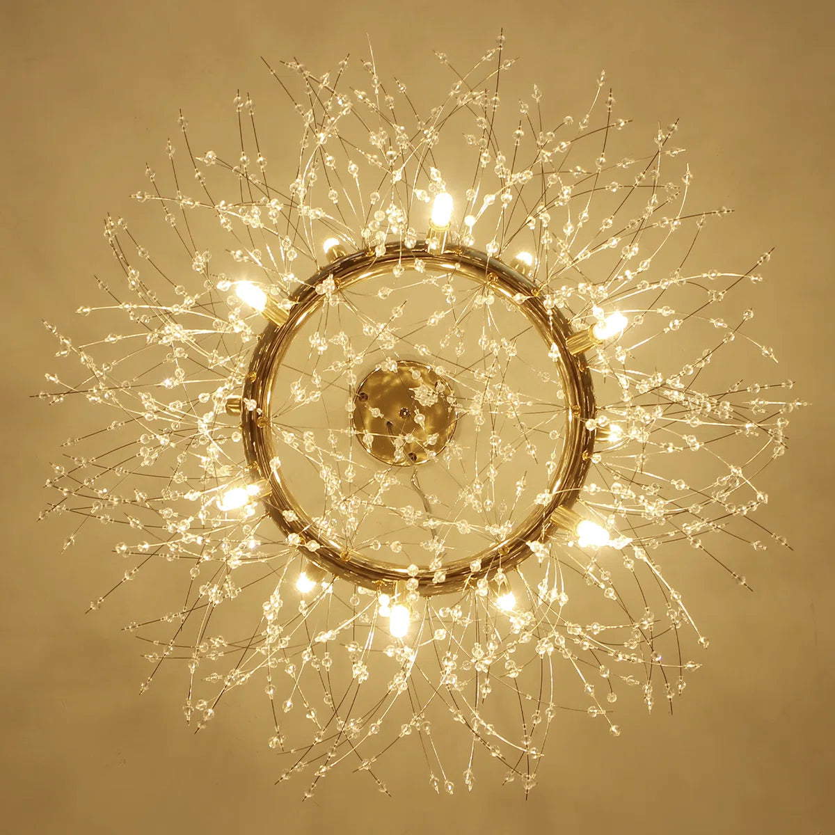 Light geometric starburst sunburst pendant from Dandelion 12 collection by TheChandelierCo, featuring intricate design.