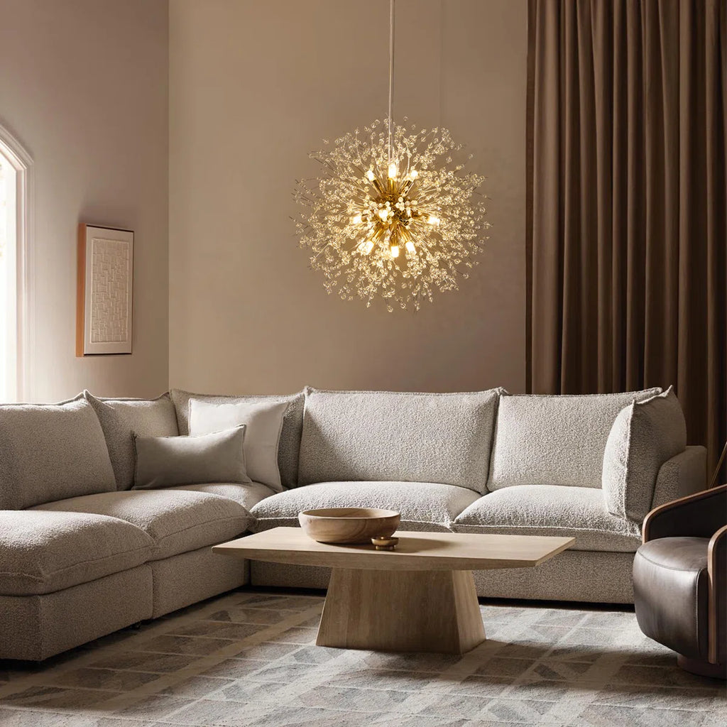 Dandelion 9-light Sputnik crystal chandelier with starburst design, hanging from a ceiling fixture, featuring multiple crystal arms and bulbs