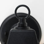 Black outdoor wall lantern by TheChandelierCo with a classic design, featuring clear glass panels and a sturdy metal frame.