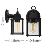 Black outdoor wall lantern by TheChandelierCo with classic design, mounted on a wall, ideal for exterior lighting.