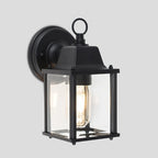 Black outdoor wall lantern by TheChandelierCo with classic design, mounted on a wall for exterior lighting and decoration.