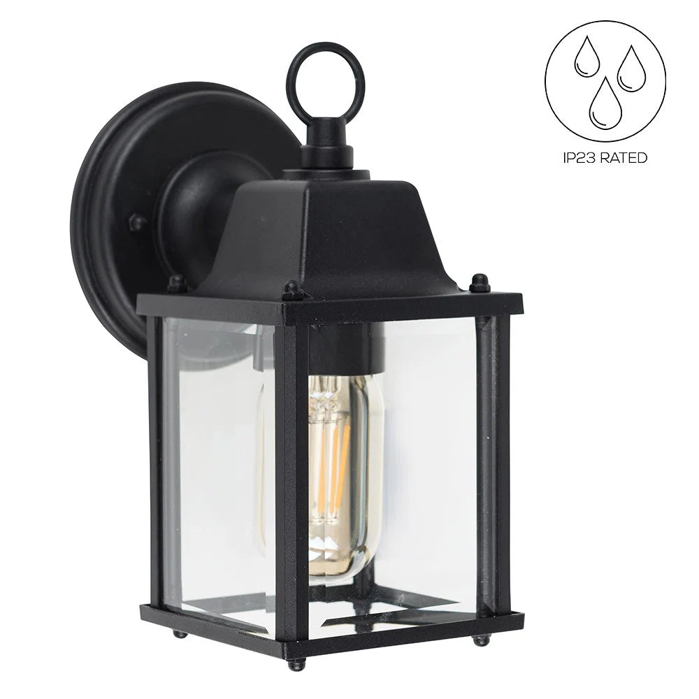 Black outdoor wall lantern by TheChandelierCo with classic design and clear glass panels for exterior lighting.