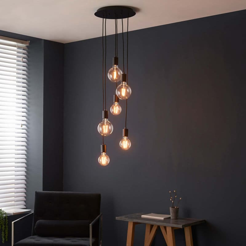 Drishya 6 light cluster pendant by TheChandelierCo featuring six elegant hanging pendant lights with a modern design.