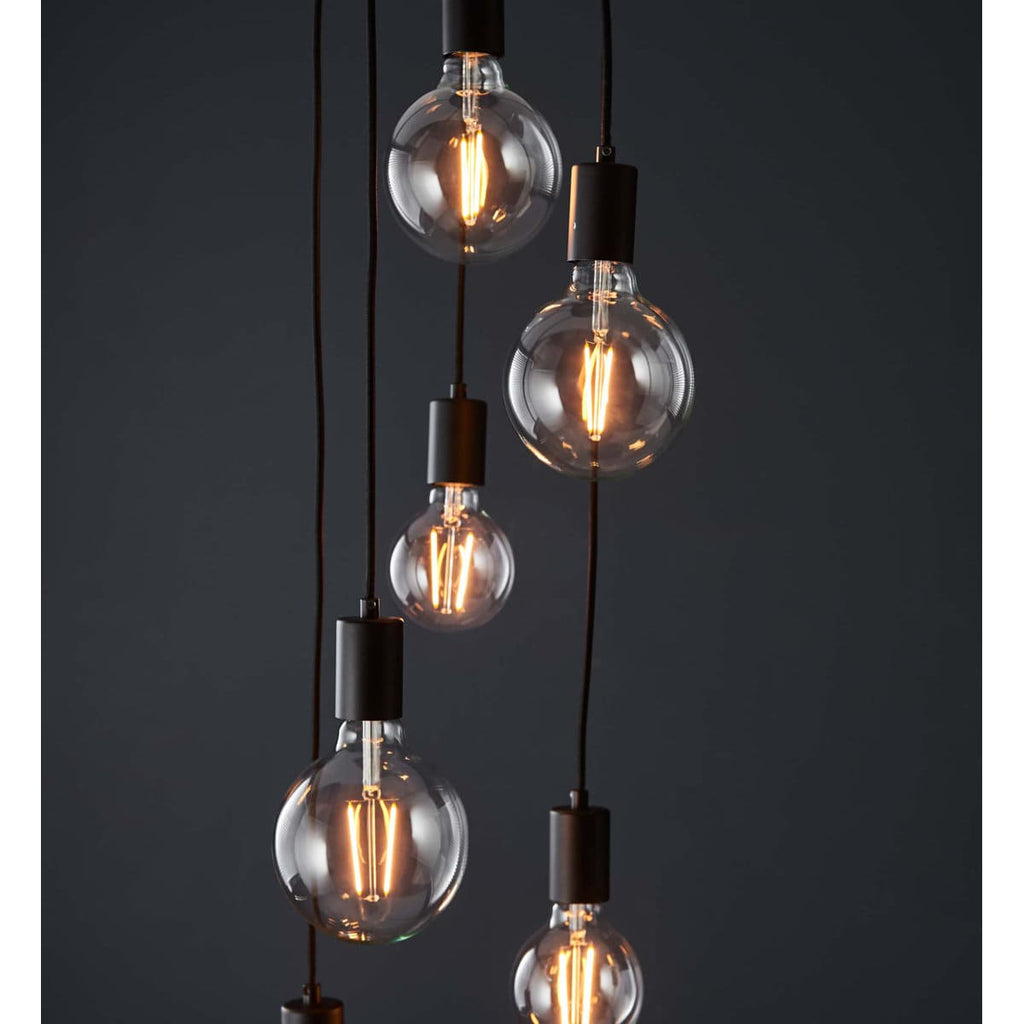 Drishya 6 Light Cluster Pendant by TheChandelierCo featuring six elegant hanging pendant lights with a modern design.
