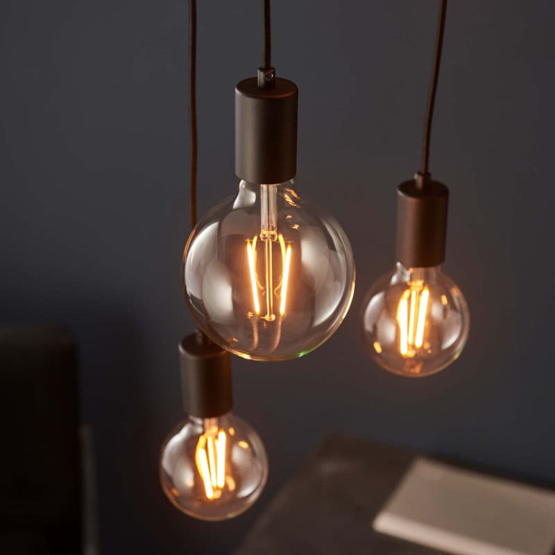 Drishya 6 Light Cluster Pendant by TheChandelierCo featuring six elegant hanging lights with a modern design.