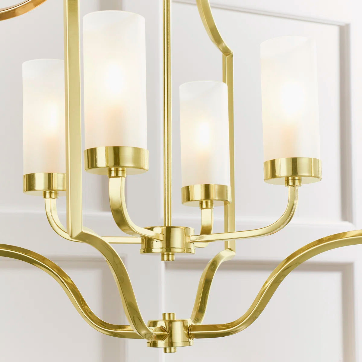 Glenmoor 4 light candle-style chandelier by TheChandelierCo featuring classic candle holders and elegant metal detailing.