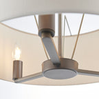 Katrina 3-light drum chandelier by TheChandelierCo with a sleek metal frame and light fabric drum shade, hanging from a ceiling mount.