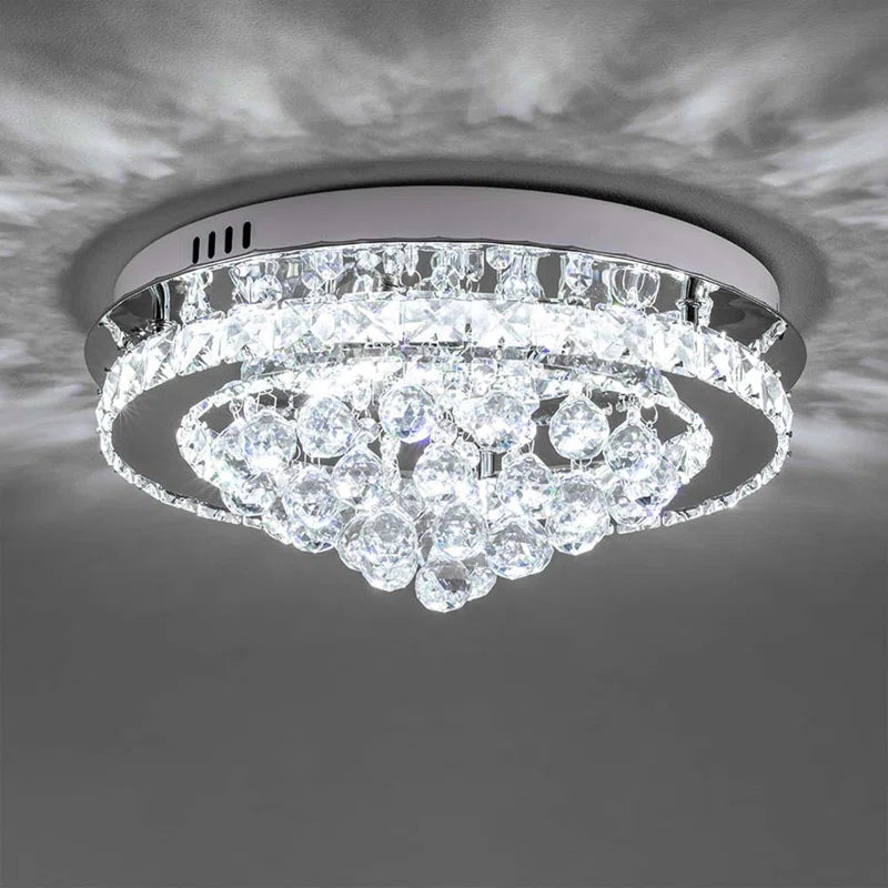 Hurt 40cm LED crystal integrated flush mount light by TheChandelierCo with a sleek design and crystal accents.
