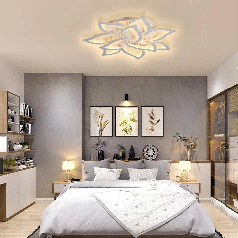 Izzabella 10-light acrylic LED flush mount chandelier from TheChandelierCo, featuring a sleek round design and bright illumination.