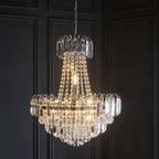 Elegant Jayla 6 light chandelier by TheChandelierCo featuring a sleek modern design with six illuminated glass shades.