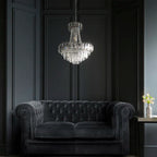 Elegant Jayla 6 light chandelier by TheChandelierCo featuring a modern design with six illuminated pendant lights.