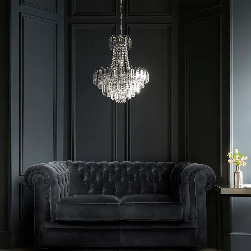 Elegant Jayla 6 light chandelier by TheChandelierCo featuring a modern design with six illuminated pendant lights.