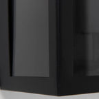 Black outdoor flush mount light fixture by TheChandelierCo, featuring a sleek modern design suitable for exterior lighting.