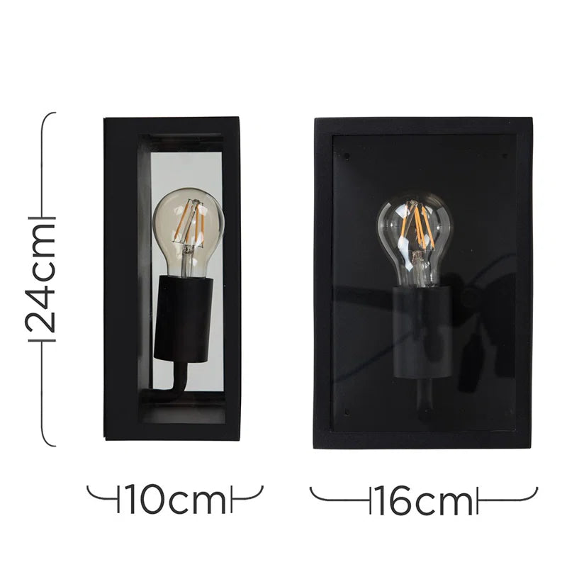 Black outdoor flush mount light fixture by TheChandelierCo, showing a sleek, modern design suitable for exterior wall lighting.