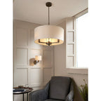 Katrina 3 light drum chandelier by TheChandelierCo featuring a modern drum shade with soft lighting and sleek design.