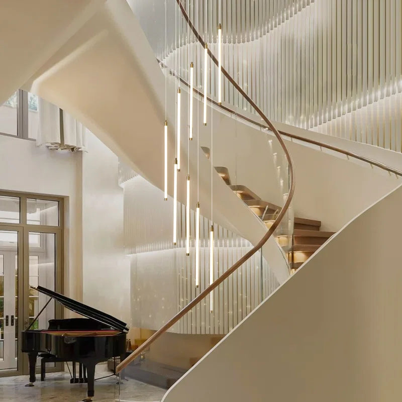 Modern dimpled LED staircase cluster pendant light by TheChandelierCo, featuring sleek design and adjustable brightness.