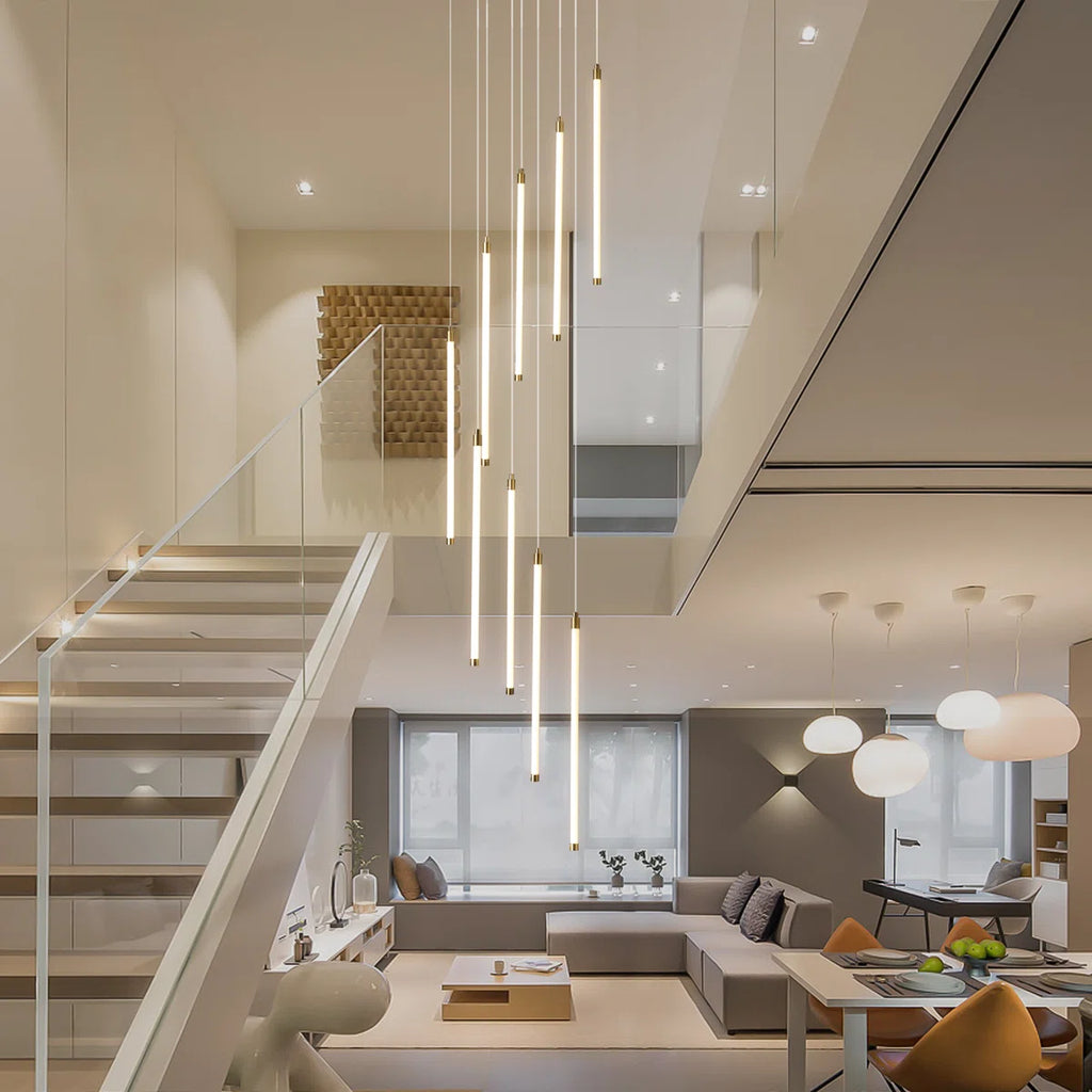 Modern dimmable LED staircase cluster pendant light by TheChandelierCo, featuring sleek design and warm illumination.