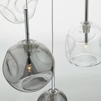 Kensley 6-light chrome cluster pendant chandelier with modern design, featuring six exposed bulbs and sleek light chrome finish.