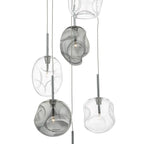 Kensley 6 light chrome cluster pendant lighting fixture with six glass shades hanging in a modern design.