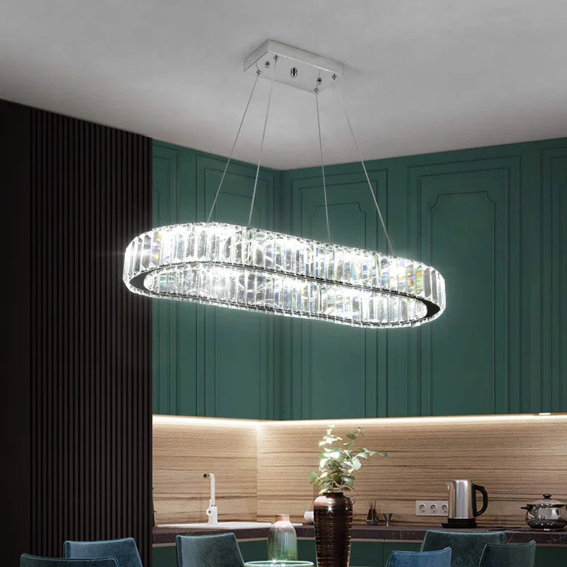 Light crystal LED chandelier by TheChandelierCo with hanging crystal accents and modern design for elegant illumination.