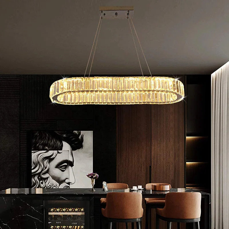 Light crystal LED chandelier from Kirt 1 collection by TheChandelierCo featuring multiple sparkling crystal strands and modern design.