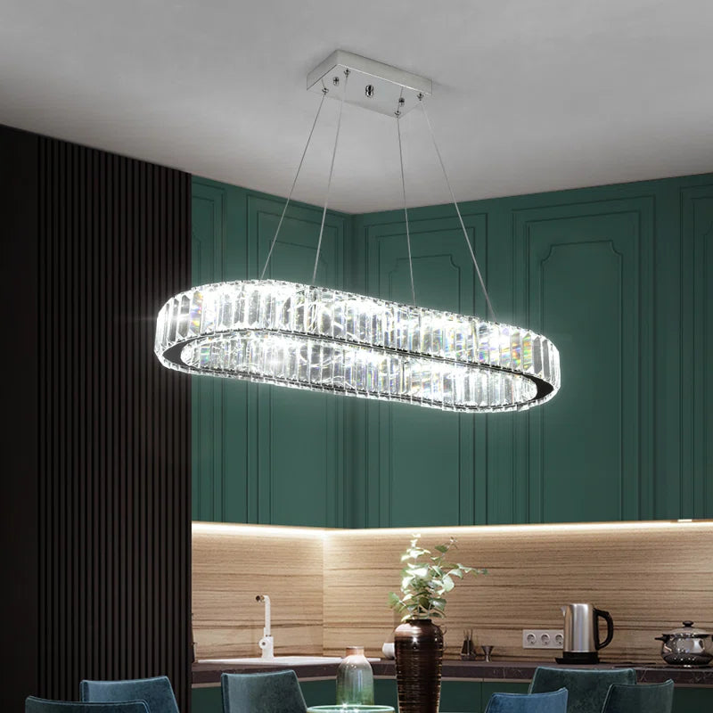 Elegant Kirt 1 Light Crystal LED Chandelier by TheChandelierCo featuring shimmering crystal accents and modern design.