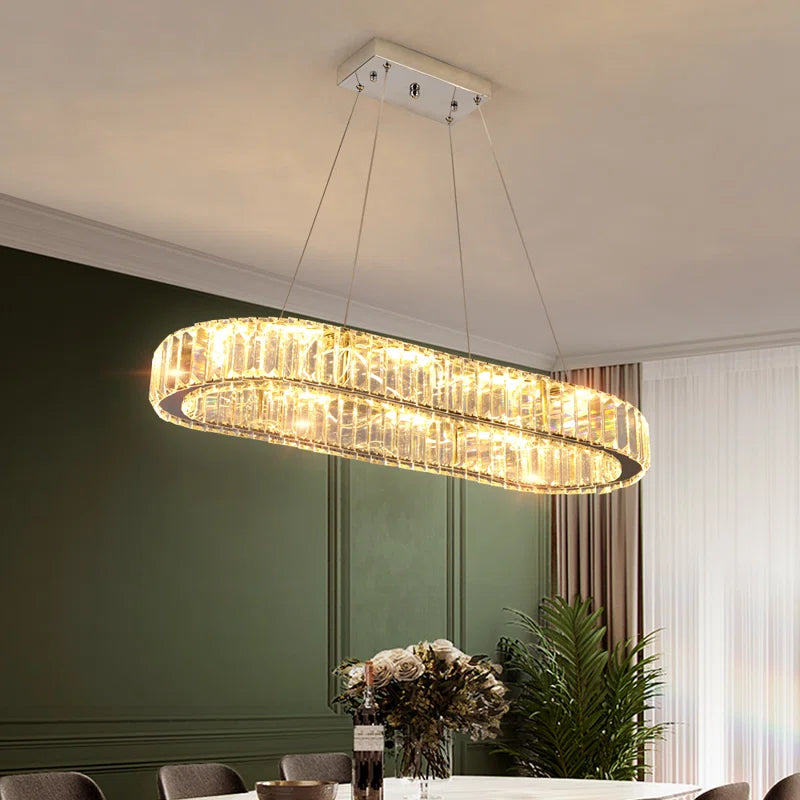 Light crystal LED chandelier from Kirt 1 by TheChandelierCo, featuring elegant hanging crystals and modern LED lighting.