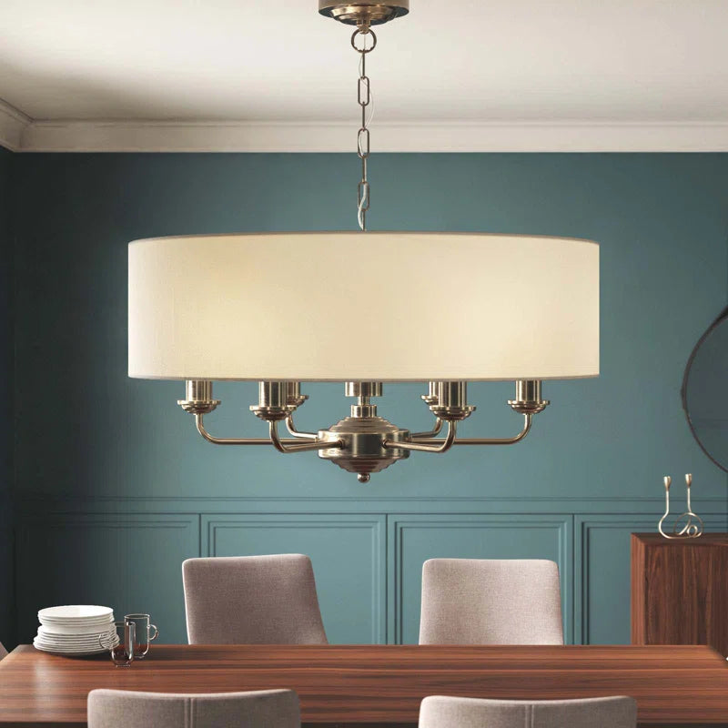Landover 6 light drum chandelier by TheChandelierCo featuring a sleek drum shade and modern lighting design.
