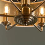 Landover 6 light drum chandelier by TheChandelierCo with a modern drum shade and hanging design, suitable for contemporary interiors.