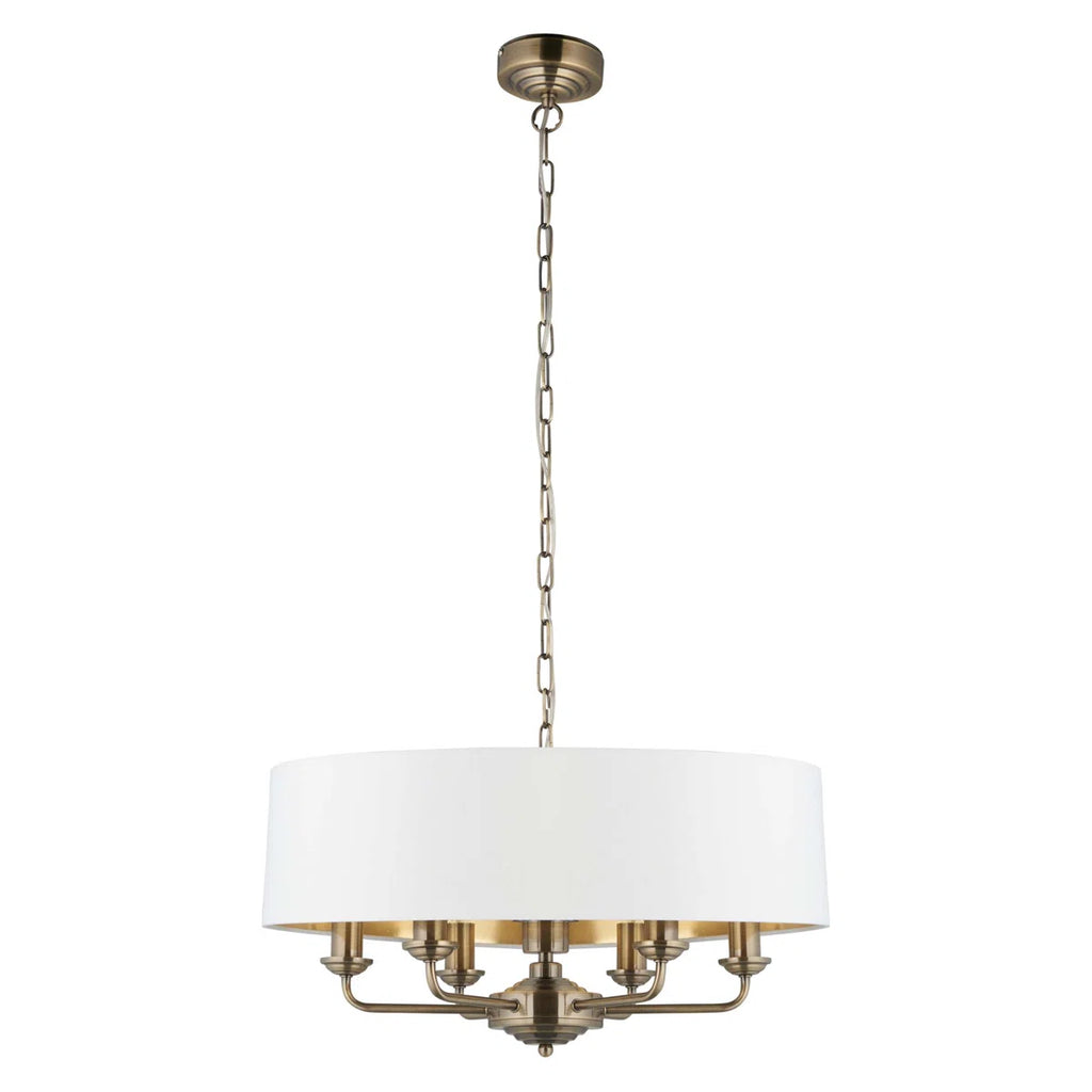Landover 6 light drum chandelier by TheChandelierCo featuring a modern drum shade and hanging light fixtures.