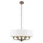 Landover 6 light drum chandelier by TheChandelierCo featuring a modern drum shade and hanging light fixtures.