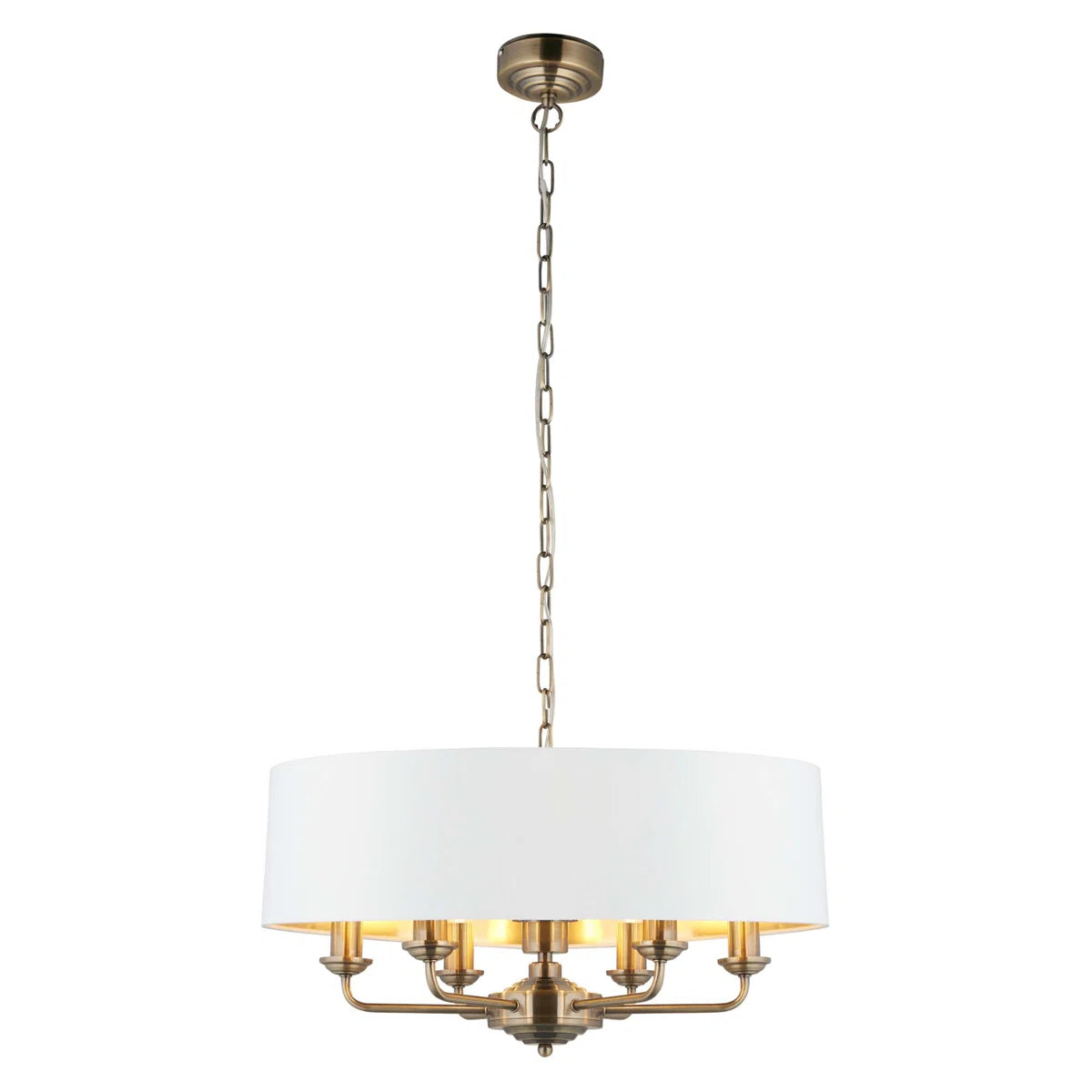 Light drum chandelier with six drum-shaped shades from TheChandelierCo, featuring a modern design and warm ambient lighting.