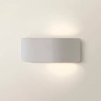 Ceramic Laura flush-mounted sconce by TheChandelierCo, featuring a sleek, modern design with a ceramic finish and soft ambient lighting.