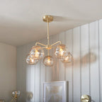 Elegant Litchford 5-light chandelier by TheChandelierCo featuring a modern design with five hanging light fixtures and sleek metal finish.