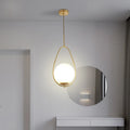 Modern Malchow LED pendant light by TheChandelierCo featuring a sleek, minimalist design with a glowing light fixture.