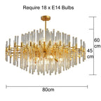 Elegant Mchugh 18 light chandelier by TheChandelierCo featuring multiple glass shades and intricate metal detailing.