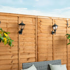 Set of two Midlothian matte black outdoor wall lanterns with integrated LED bulbs, 22cm high, solar-powered by TheChandelierCo.