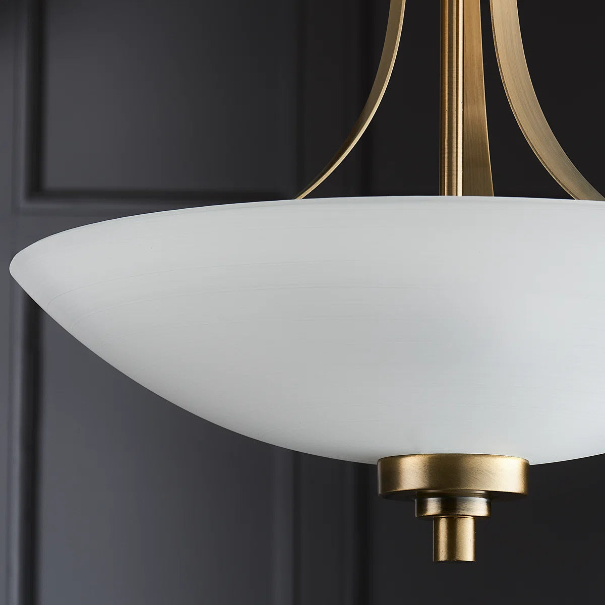 Miltiades glass semi-flush mount ceiling light by TheChandelierCo with a sleek, modern design and clear glass shade.