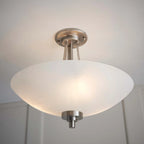 Miltiades glass semi-flush mount ceiling light by TheChandelierCo featuring a clear glass shade and metal fixture.