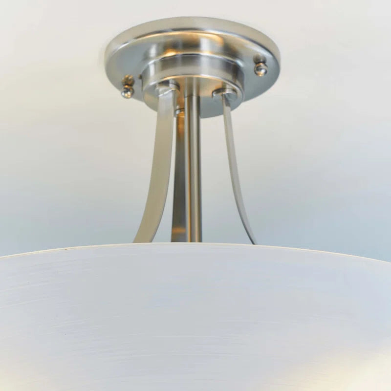 Elegant Miltiades glass semi-flush mount ceiling light by TheChandelierCo with clear glass shade and modern design.