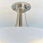 Elegant Miltiades glass semi-flush mount ceiling light by TheChandelierCo with clear glass shade and modern design.